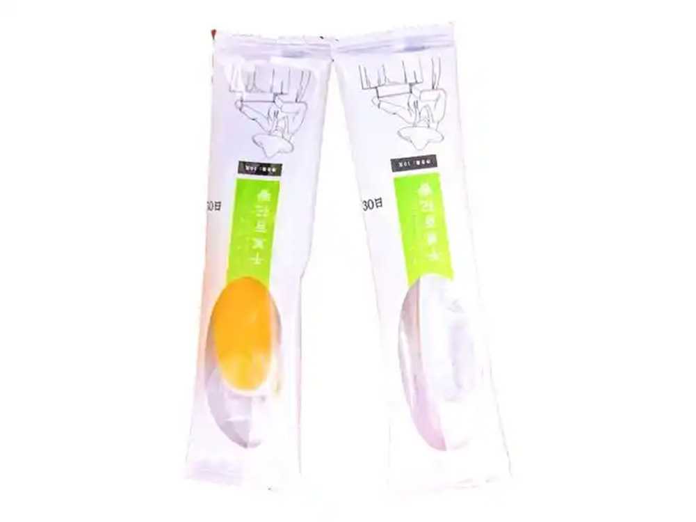 呂工機(jī)械全自動(dòng)勺子灌裝封口機(jī)——解決蜂蜜、膏方、秋梨膏等高黏物料包裝難題